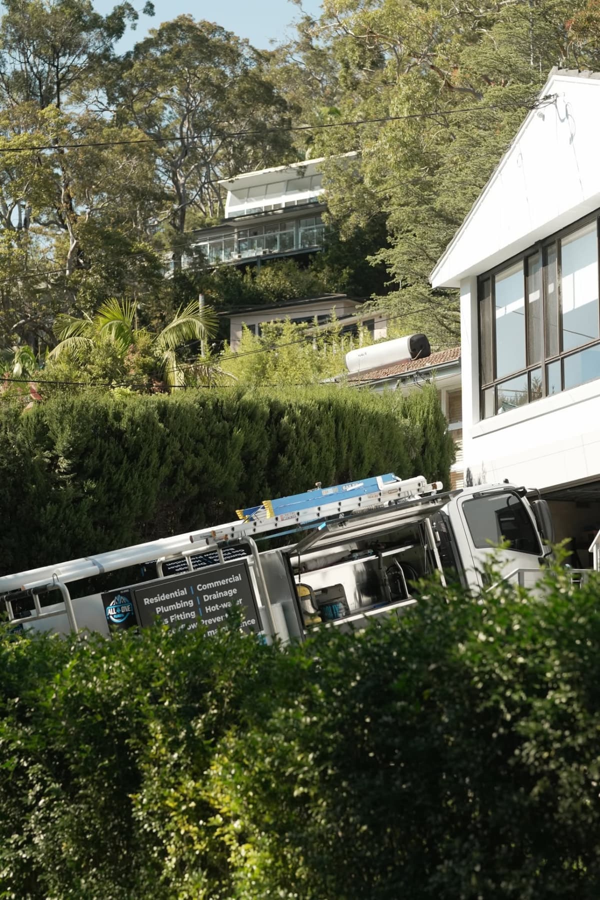 The truck pulled into a driveway for a house call